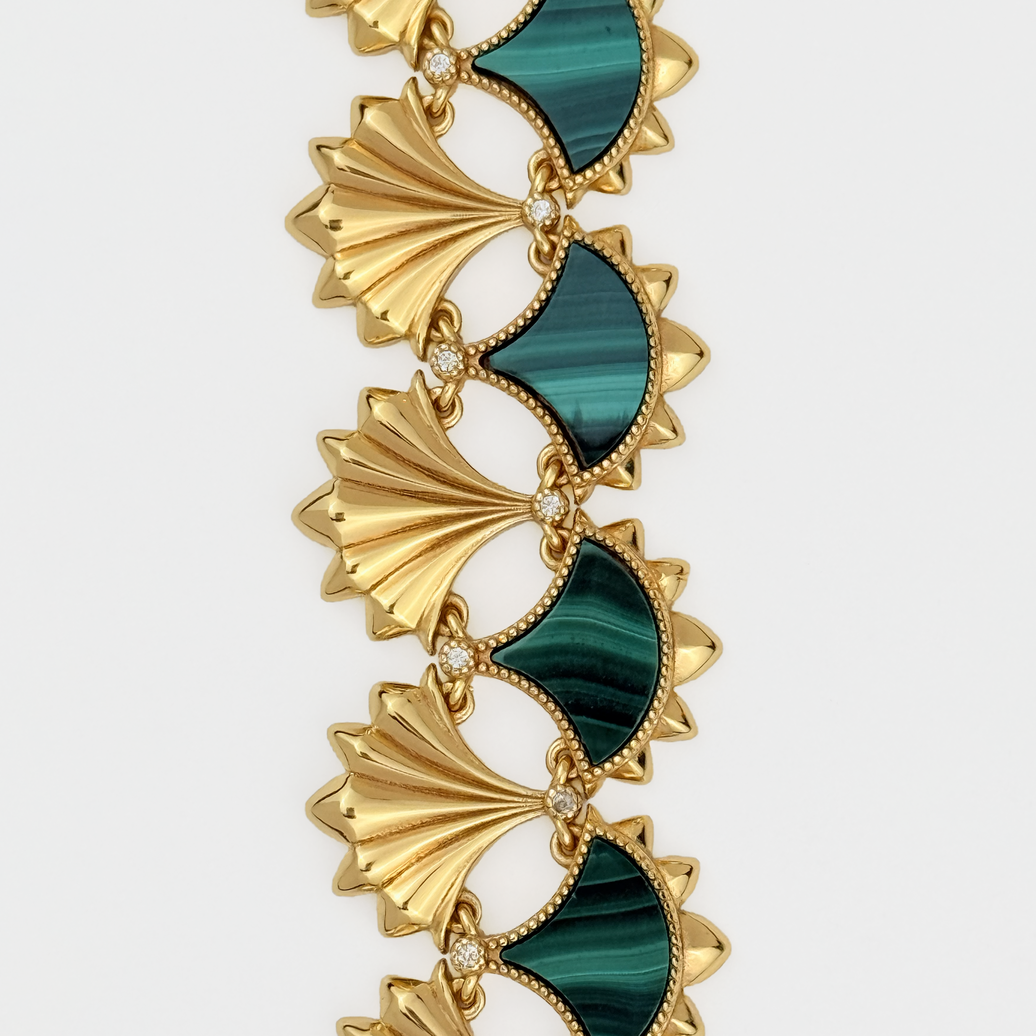 Closeup of Gold Vermeil and Malachite Bracelet on a white background