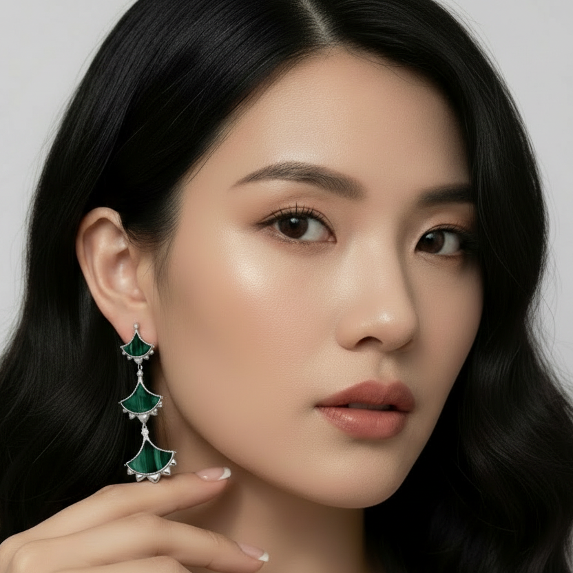 Woman wearing a pair of Cirque D'Or Malachite and Zircon Statement Drop Earrings in Gold Vermeil on Sterling Silver finish.