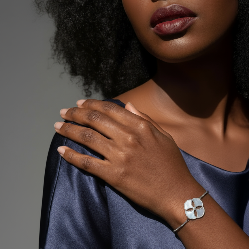 Woman wearing a Mother Of Pearl and Zircon Bracelet from Cirque D'Or in Rhodium on Sterling Silver finish.