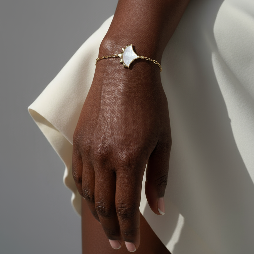 Woman wearing a Mother Of Pearl and Zircon Bracelet from Cirque D'Or in Gold Vermeil Sterling Silver finish.
