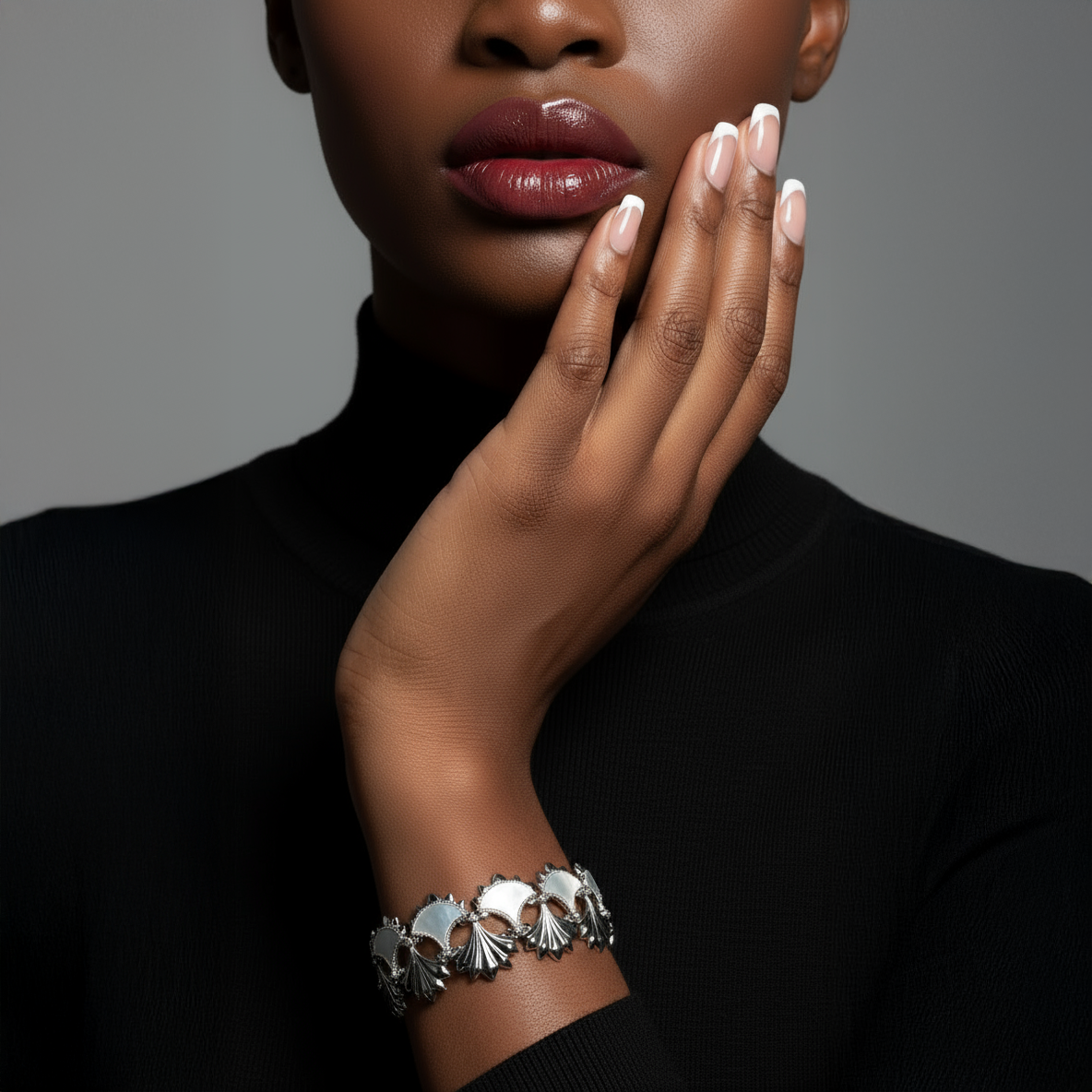 Woman wearing a Mother Of Pearl and Zircon Bracelet from Cirque D'Or in Rhodium on Sterling Silver finish.
