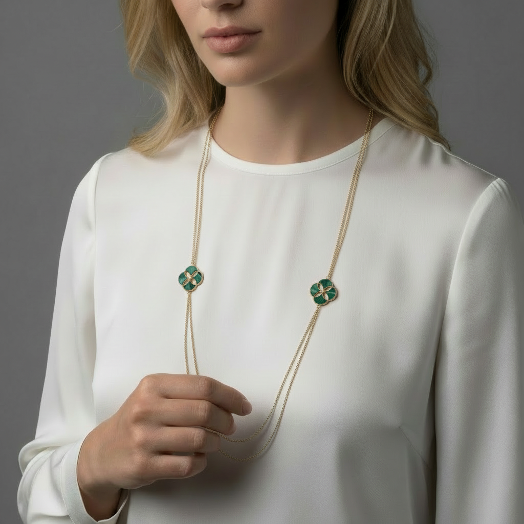 Woman wearing a Malachite and Zircon necklace from Cirque D'Or in Vermeil on Sterling Silver.