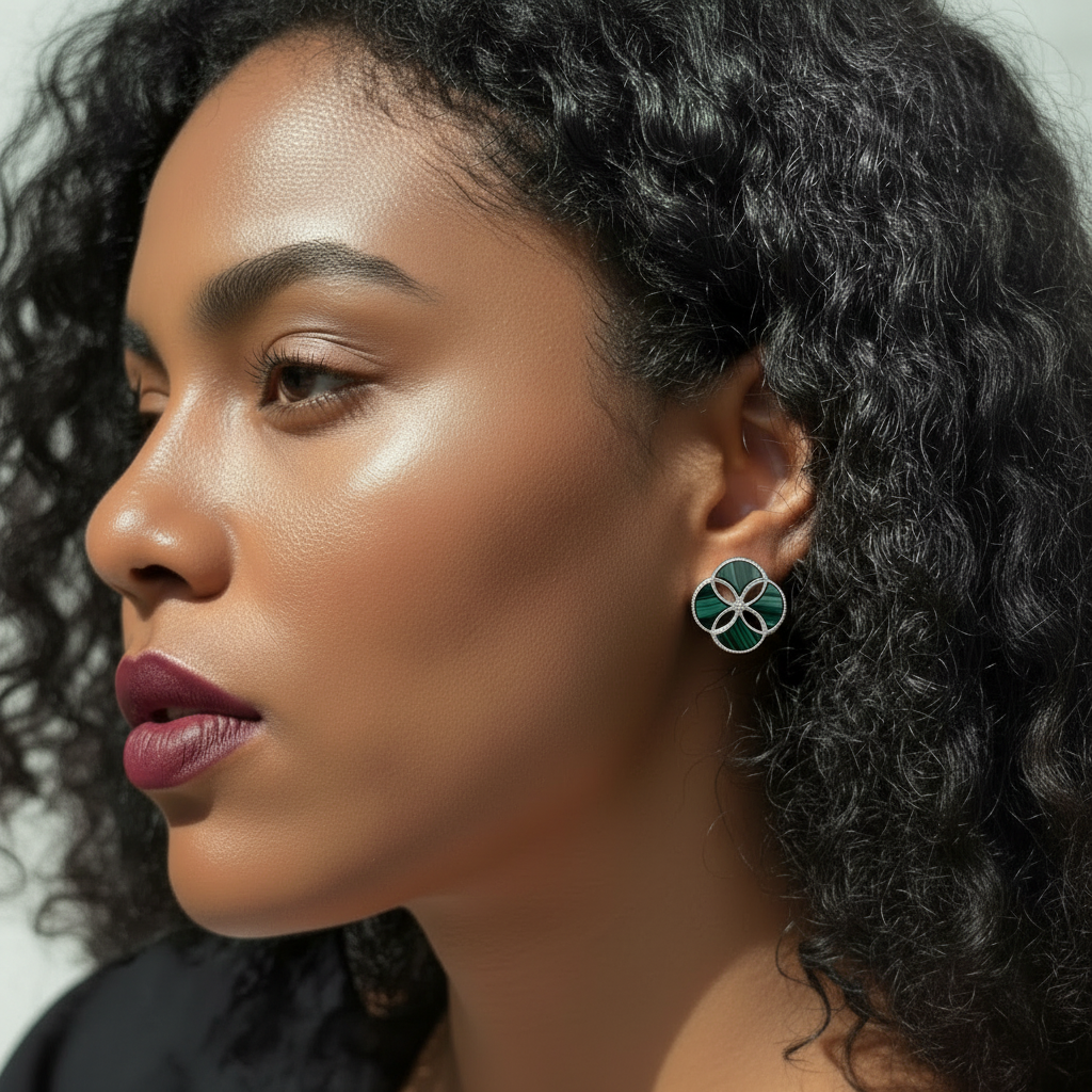 Woman wearing a pair of Cirque D'Or Malachite and Zircon Stud Earrings in Rhodium on Sterling Silver finish.