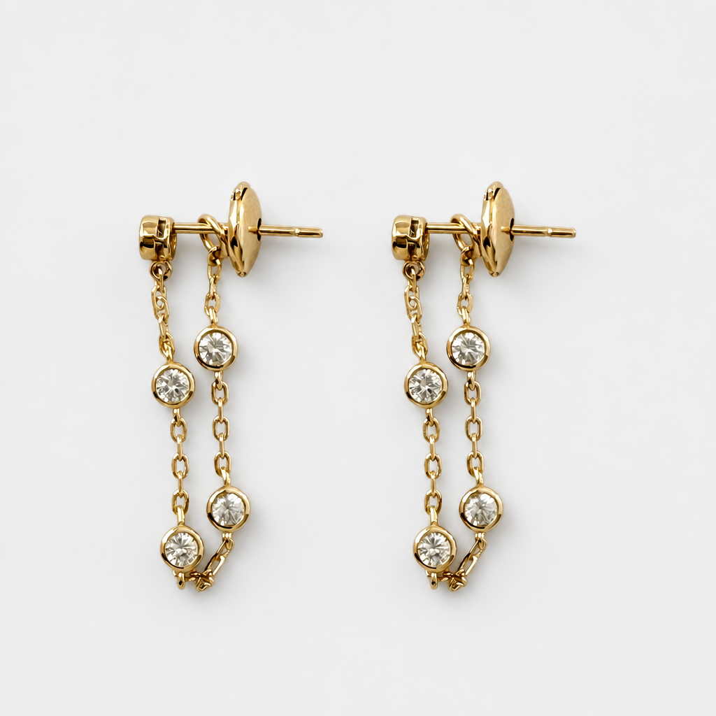 Tempo Line Zircon Stud Earrings in 18kt Gold Vermeil over Sterling Silver worn on ear, showcasing minimalist linear sparkle | Cirque D'Or Canada USA