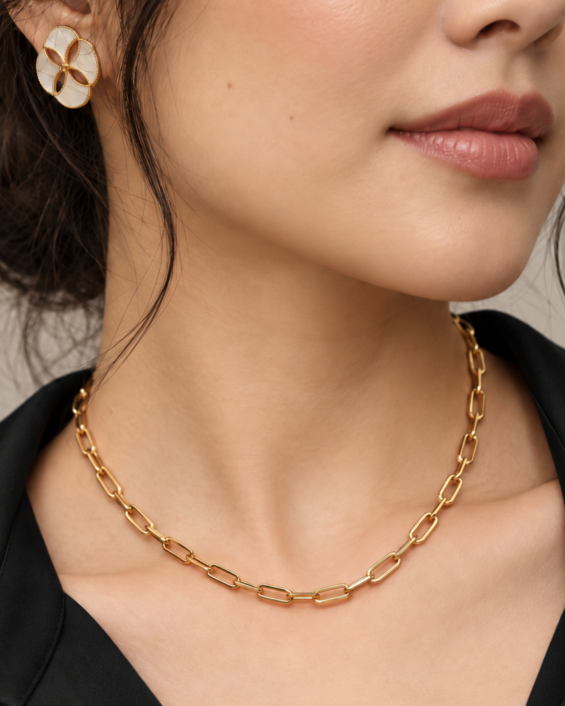 Model wearing a gold-tone paperclip necklace