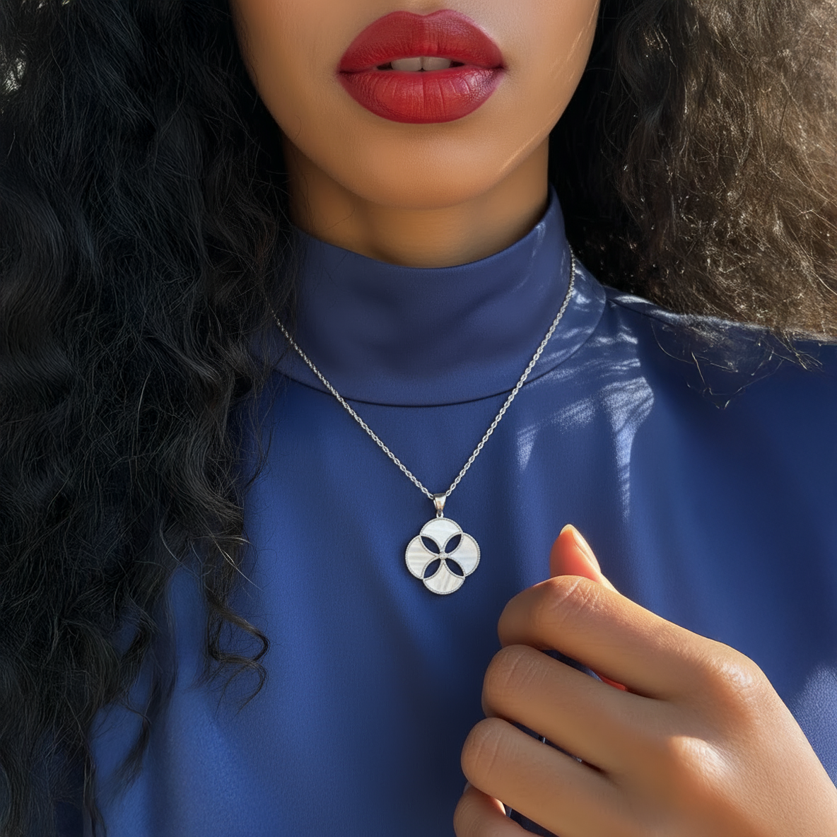 Woman wearing a Mother Of Pearl and Zircon necklace from Cirque D'Or in Rhodium on Sterling Silver finish.