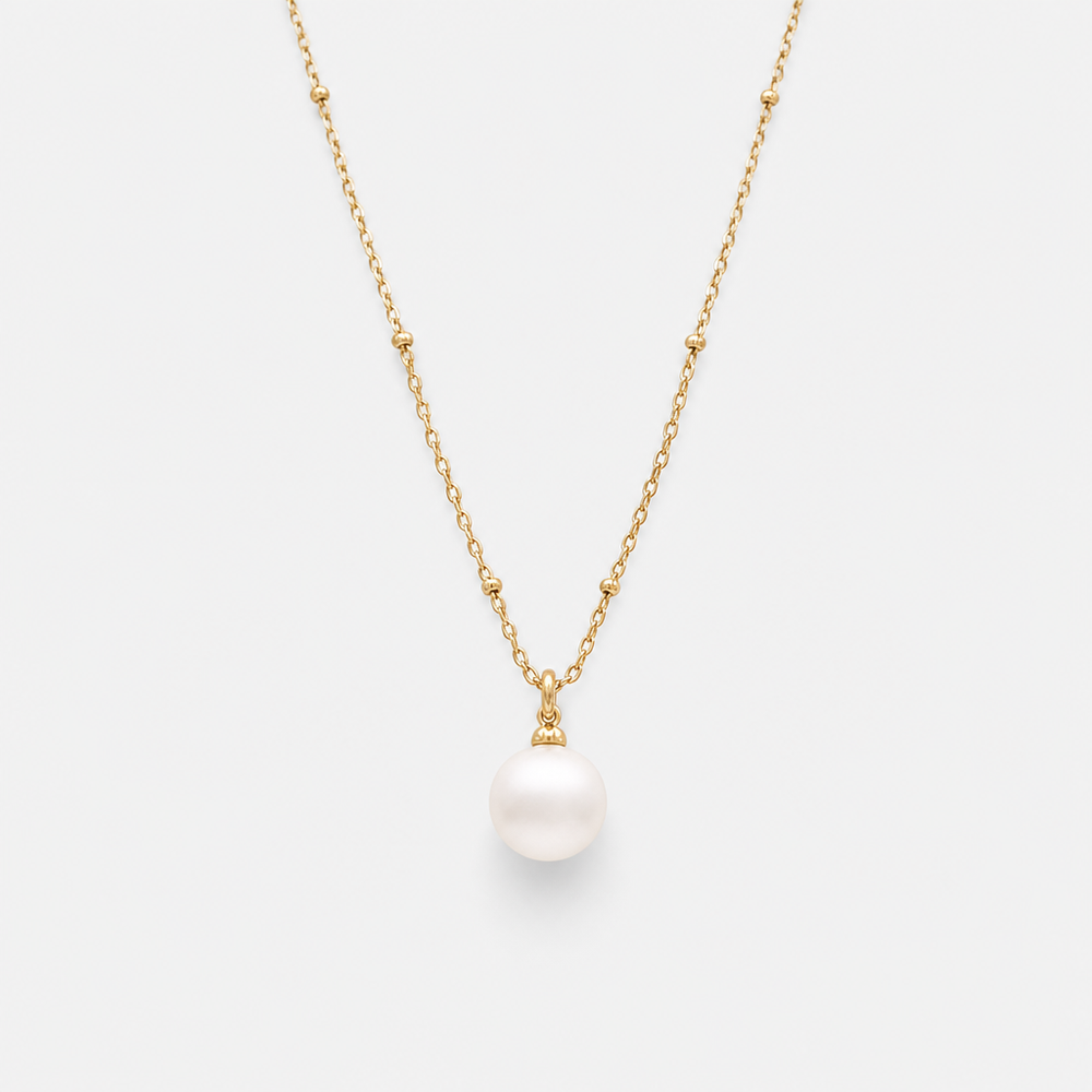 Front view of Tempo Solo Freshwater Pearl Necklace in 18kt gold vermeil with a single suspended pearl | Cirque D'Or Canada USA