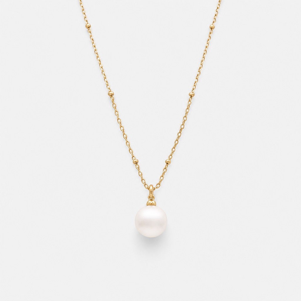 Front view of Tempo Solo Freshwater Pearl Necklace in 18kt gold vermeil with a single suspended pearl | Cirque D'Or Canada USA