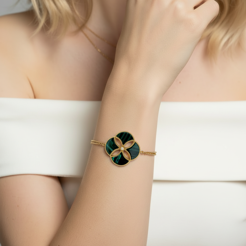Woman wearing a Malachite and Zircon Bracelet from Cirque D'Or in Gold Vermeil on Sterling Silver finish.