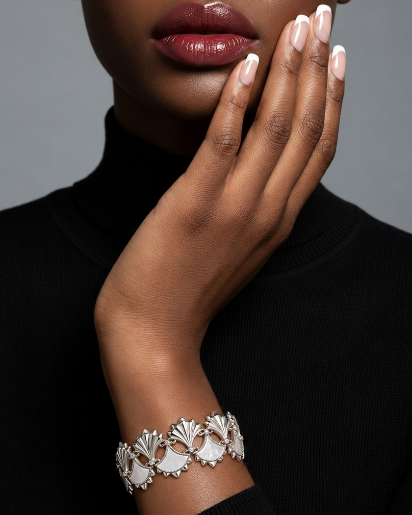 Model wearing a silver-tone Dôme mother-of-pearl eternity bracelet