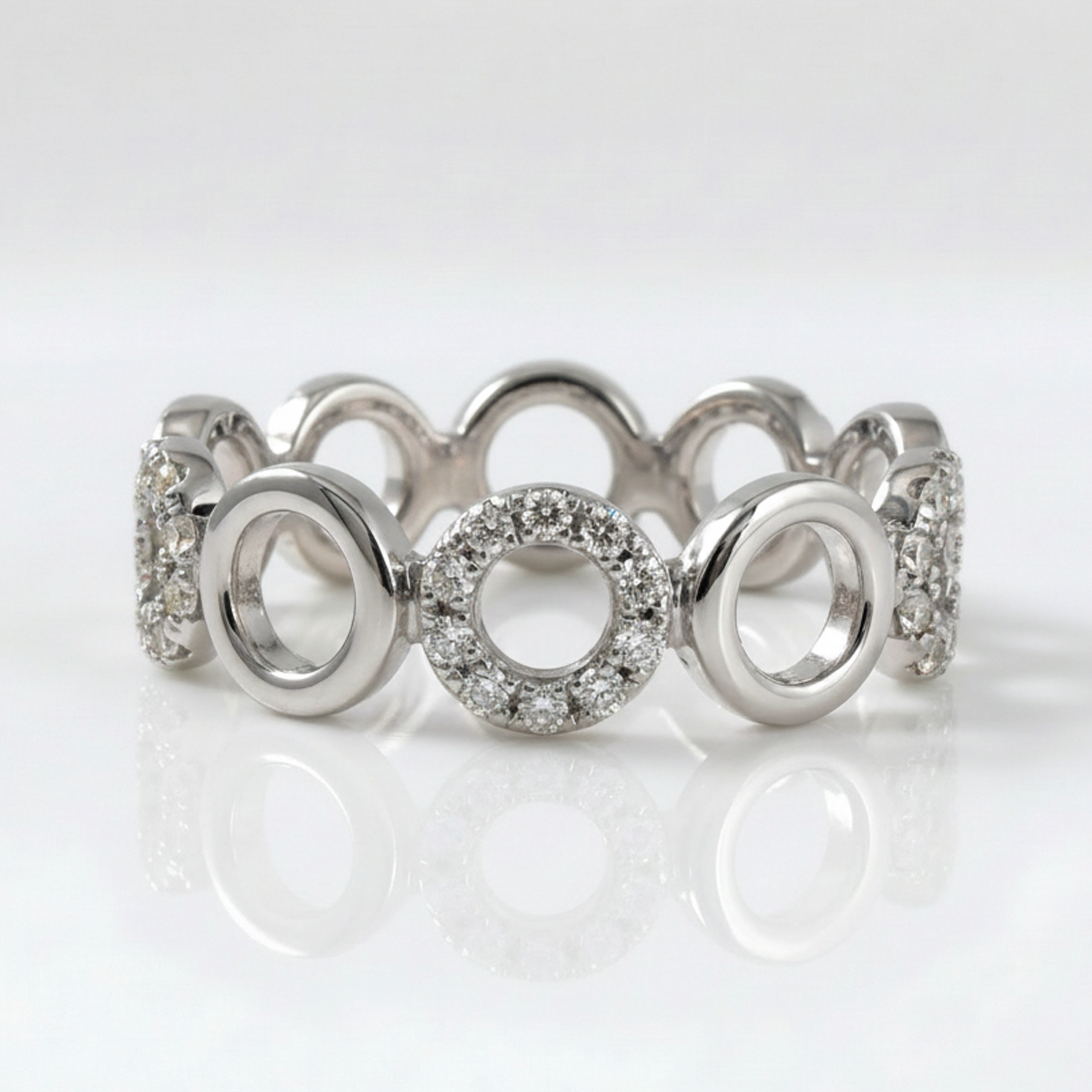 Rhodium Tempo Cyr Continuum Zircon Ring with interlocking circular links and pavé zircon in a continuous modern band | Cirque D'Or Canada USA