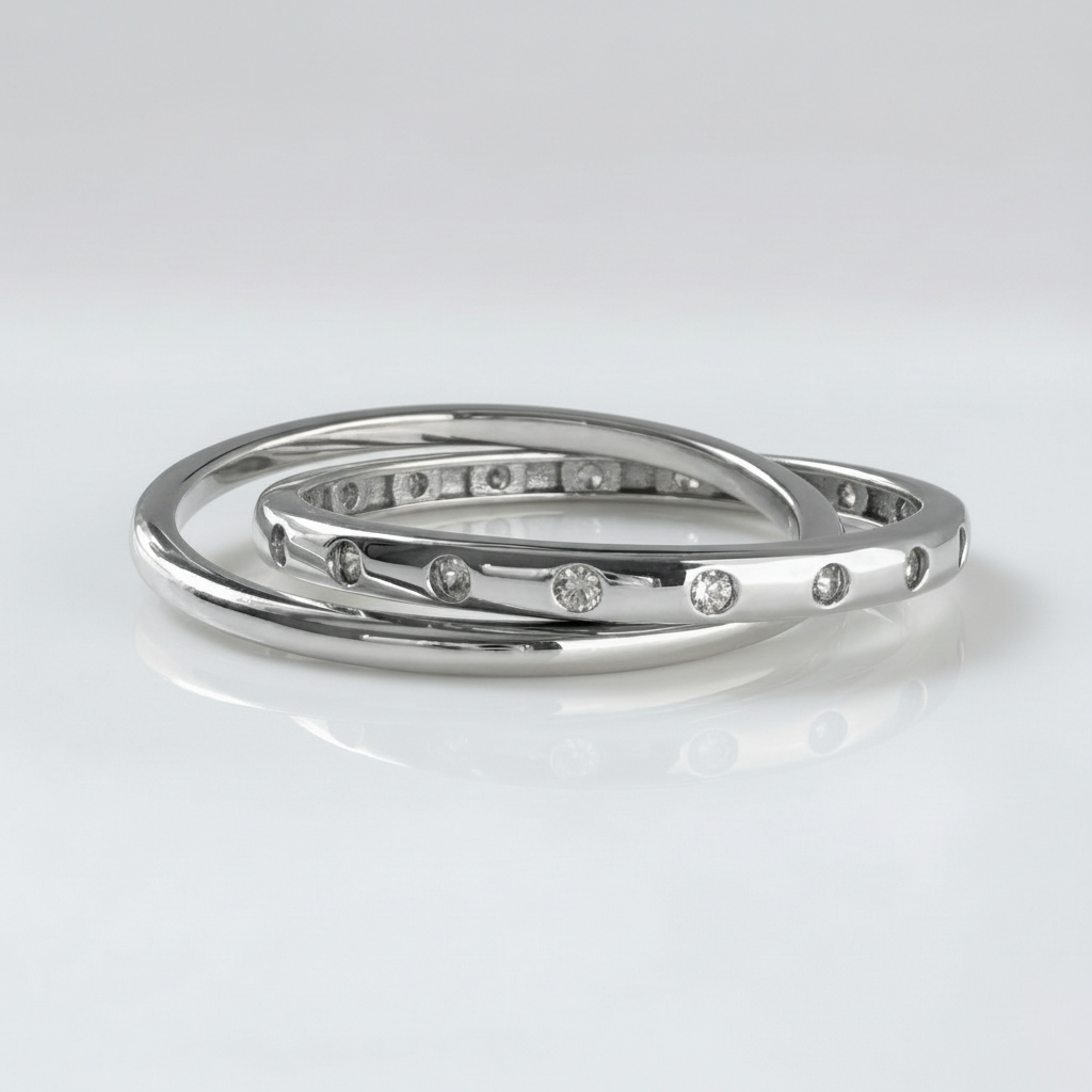 Interlocking zircon ring in rhodium-plated sterling silver, displayed on neutral background | Cirque D'Or Canada USA