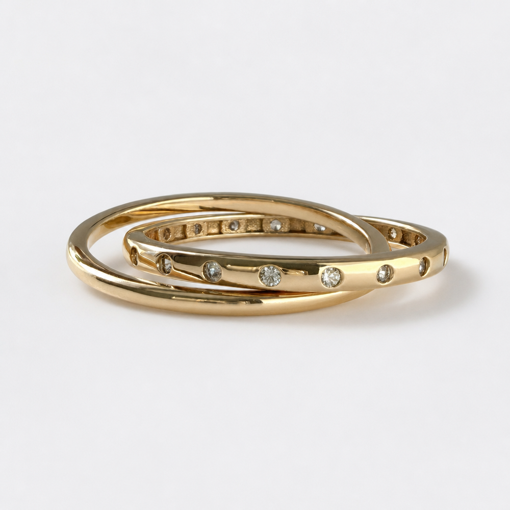 Interlocking zircon ring in 18kt gold vermeil over sterling silver, displayed on neutral background | Cirque D'Or Canada USA