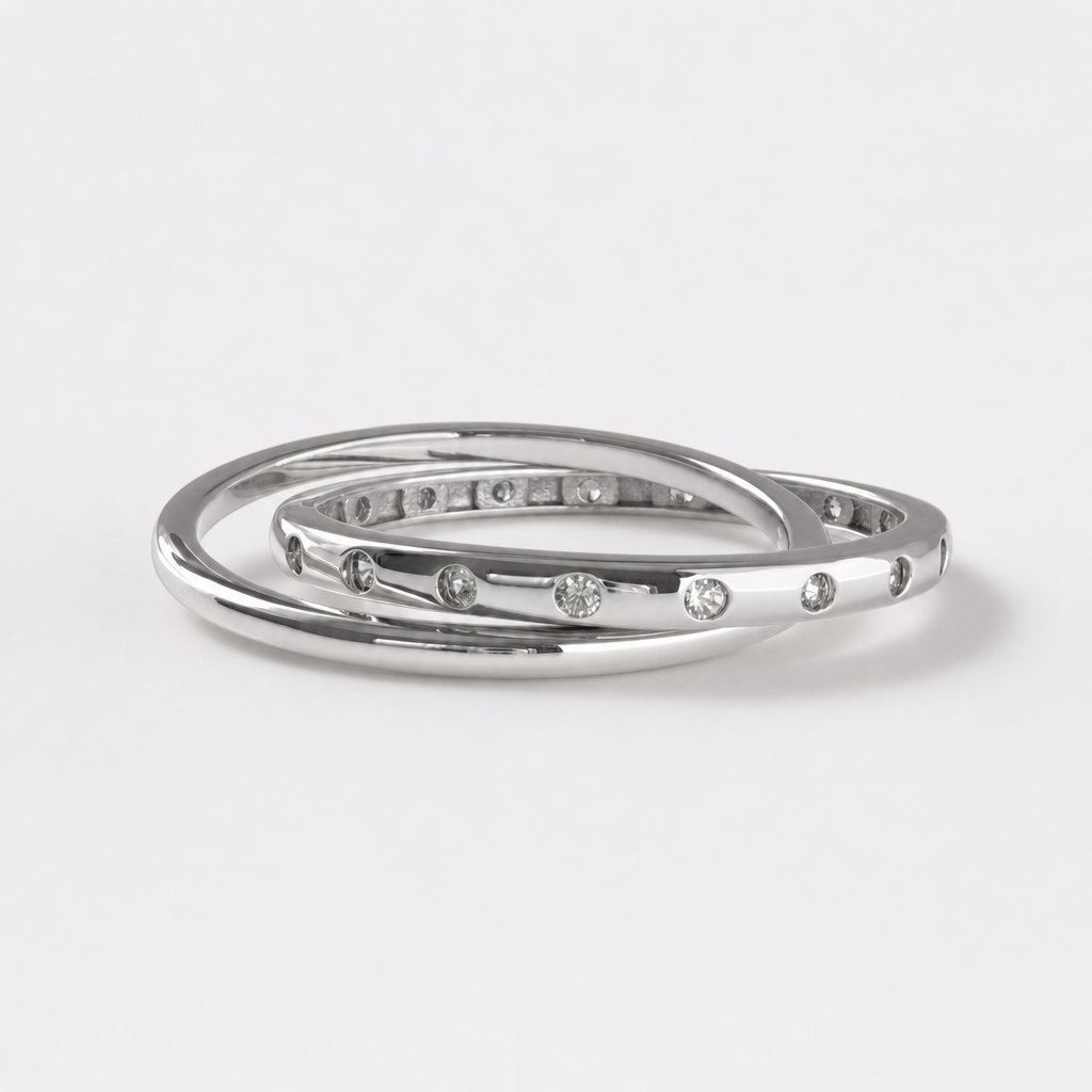 Interlocking zircon ring in rhodium-plated sterling silver, displayed on neutral background | Cirque D'Or Canada USA