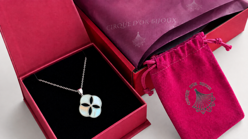 Cirque D’Or jewellery with protective pouch, box and tissue paper